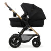 c04cbc62-1093-4394-bae3-e6911a820c7a Poussette Trio MOOV 2 AIR - Noir